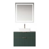 Modern wall-mounted vanity in a deep green ribbed finish with a rectangular white above-counter basin and gold accents. Paired with a round LED mirror and set against a dark wall, complemented by a serene outdoor view of a tree.
Contemporary vanity available in green and white ribbed finishes, featuring a pure white sintered stone countertop and rectangular above-counter basin. Paired with a round LED mirror for a sleek and elegant bathroom design.