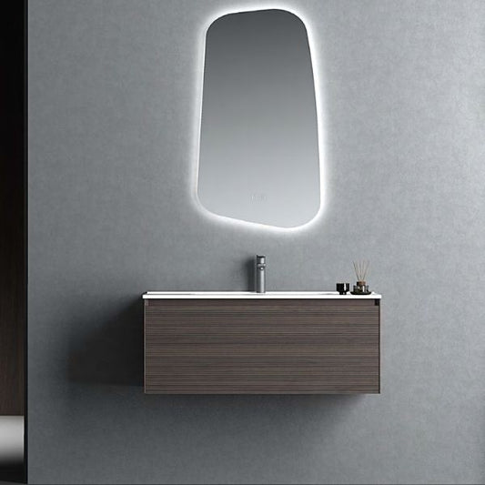 Modern double vanity with ash wood veneer finish and an integrated solid surface basin, paired with dual oval LED mirrors. Complemented by a tall matching storage cabinet, creating a clean and natural aesthetic in a tiled bathroom.
Contemporary ash wood veneer vanity featuring push-open drawers, an integrated solid surface basin, and oval LED mirrors. The design highlights simplicity and functionality for modern bathroom interiors.