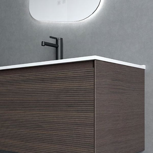 Modern double vanity with ash wood veneer finish and an integrated solid surface basin, paired with dual oval LED mirrors. Complemented by a tall matching storage cabinet, creating a clean and natural aesthetic in a tiled bathroom.