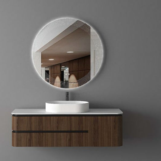 Modern wall-mounted vanity with a dark walnut melamine finish, artificial stone countertop, and a matte white ceramic basin. Highlighted by a sleek round LED mirror with intricate edge detailing, set against a gray wall.
Stylish dark walnut vanity featuring three soft-closing drawers, an artificial stone countertop, and a matte white ceramic basin. Paired with a round LED mirror and a minimalist design perfect for contemporary interiors.