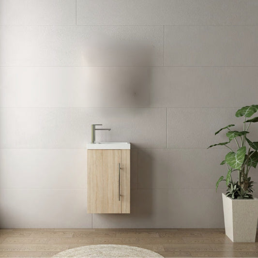 Compact wall-hung vanity with a matt white melamine finish, featuring one door with a long chrome handle and an adjustable interior shelf. Designed with DTC soft-closing hinges and an A-grade ceramic basin for modern functionality.
Stylish wall-hung vanity with an oak melamine finish, including one door with a sleek chrome handle and an adjustable interior shelf. Built with DTC soft-closing hinges and an A-grade ceramic basin for a natural, minimalist bathroom design.