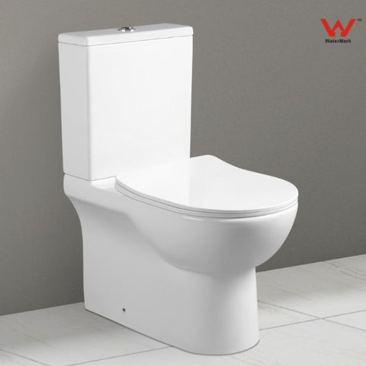 A white two-piece toilet with a closed lid, designed for wall-hung installation, showing the front view with the water tank on the top and the toilet seat down.